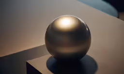 an aluminum sphere sitting on top of a table