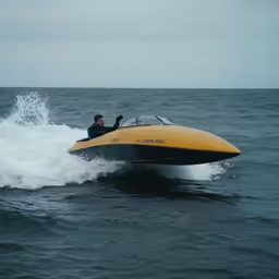 a person on a water craft out in the ocean