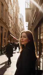 a woman standing in the middle of a street