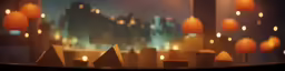 small candles placed in a display with buildings behind