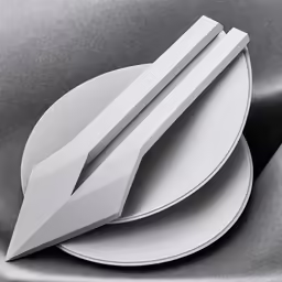 two plates with an upside down design sit on top of a metal surface