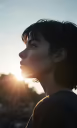 an asian woman with dark hair is staring ahead