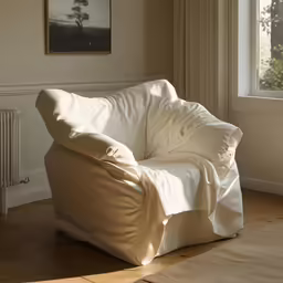 an extremely big bean bag chair in the corner of a room