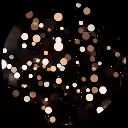a circle of white lights reflecting off of it