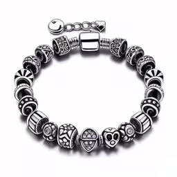 the classic silver bracelet has several beads and charms,a bracelet with a skull and cross