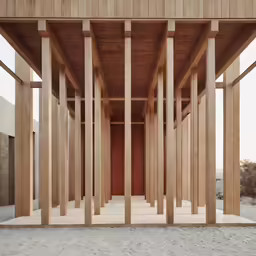 there is a very tall wooden structure with long poles