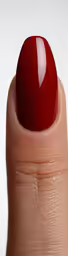 an oval red manicured with white nail art