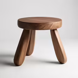an unusual stool is sitting on the floor