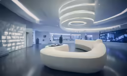 the large white couch in the large living room