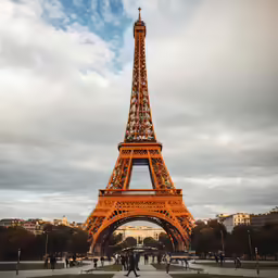 a large brick structure with the eiffel tower on top