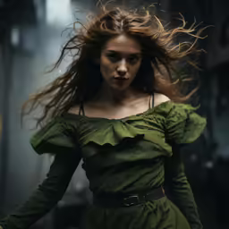 a woman wearing green clothes in the middle of a hallway