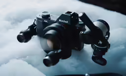 a black camera with three flash port devices