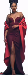 the model is wearing an off shoulder dress and has a thigh high split