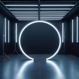 a room with lights and an empty round on the wall