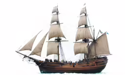 a sailing boat is seen in the water