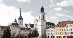 a town with some very tall buildings and two towers