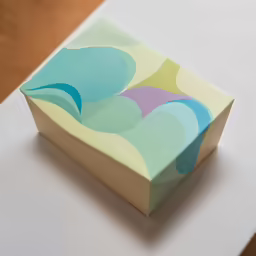 an abstract paper piece sitting on a table