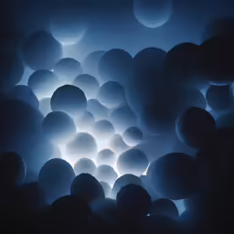 a cluster of balls with glowing lights in the background