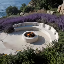 an outdoor seating area with a fire pit