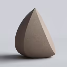 a stone triangle shaped object against a gray background