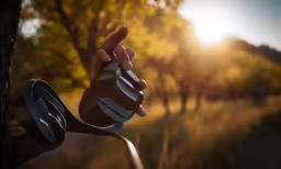 someone holding out their bike glove to the camera