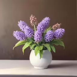 there is a white vase with a purple flower arrangement in it