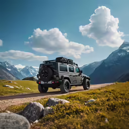 a jeep that is on a dirt road