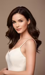 the beautiful woman in white is posing