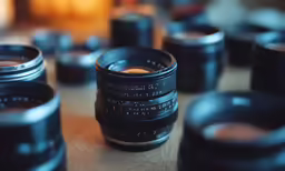 a set of two lenses sitting on a table