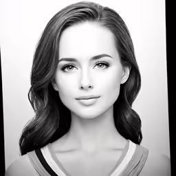 a black and white photo of a young girl