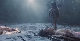two women on a snowy ground and one has a sword