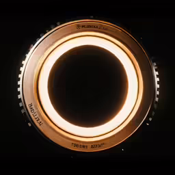 an illuminated light inside a circular light fixture