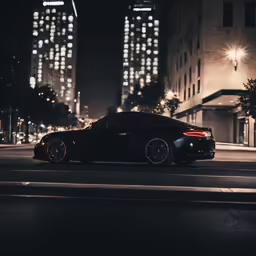 a sports car is parked near some large skyscrapers