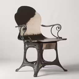 an old chair has a large brown and white seat