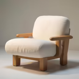 a chair with wooden legs and a white cushion
