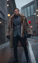 a man in a long coat and shoes, standing on the side of the street