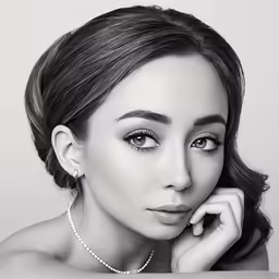 an attractive lady in a beaded necklace and pearls on her head