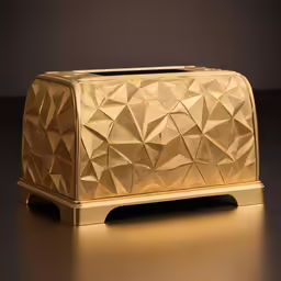 an unusual gold geometric handbag on a black table