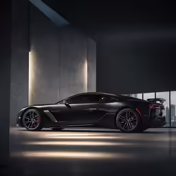 a black sports car in the dark light