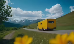 a large truck driving on a rural country road