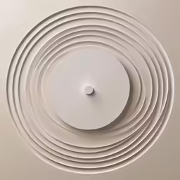 a close up of a round ventilation vent in a wall