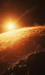 the sun is shining above grass with long exposure