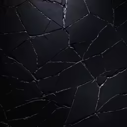 an abstract photograph of a cracked window