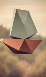 a kite with several different colored shapes hanging from it