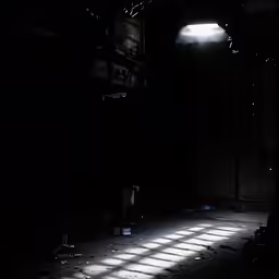 a room with some lights on and someone laying down