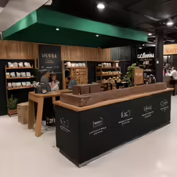 people are gathered inside a store with shelves