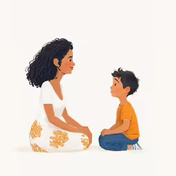 two children sitting on the ground and talking