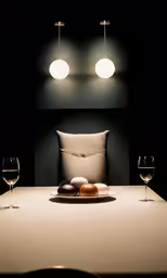 a plate that has food on it with glasses