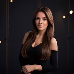 a woman in a dress is posing for the camera