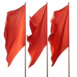 three flags with red colors flying high up